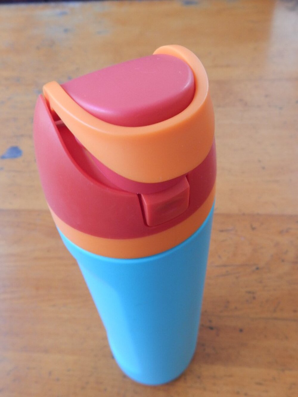Owala water bottle, blue, orange and red